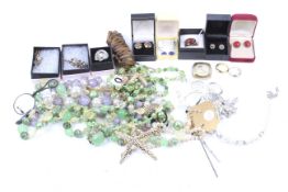 An Italian 'designer' silver-gilt, enamel and cabochon carnelian ring and other items.