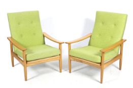 A pair of mid-century open armchairs. With re-upholstered green button back fabric.