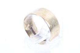 A vintage 18ct gold broad wedding band. Hallmarks for Birmingham 1969, 7.