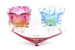 A group of three assorted mid-century case glass items.