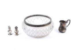 A silver mounted clear glass fruit bowl and other items.