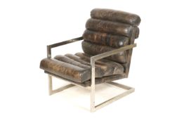 A mid-century chrome frame and brown leather lounge chair.