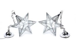 A pair of contemporary 3D 'Star' pendent ceiling light fittings.