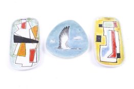 Two Italian retro geometric glazed oblong dishes and a triangular dish.