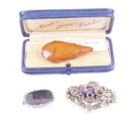 A small collection of Victorian and later jewellery including a gold and bloodstone oblong brooch.