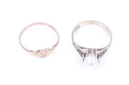 Two gold rings including an early 20th century child's rose gold octagonal signet ring.
