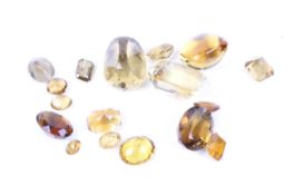 Seventeen cut citrines.