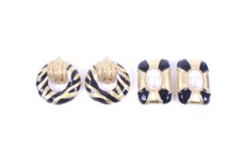 Two pairs of gold-plated and black enamel designer ear clips.
