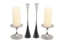 Two pairs of Robert Welch stainless steel candle holders. Arden 18 / 0 and Henley 18 / 10. Max.