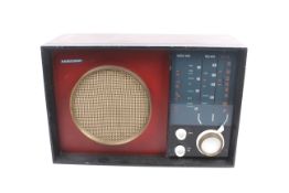 A 1960 Ferguson Radio Corporation Ltd three-band table radio, model 627U. H33cm x W50cm x D20.5cm.