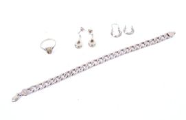 A small collection of gold jewellery including a 9ct gold filed-curb bracelet.