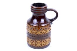 A mid-century Scheurich West German handled vase. With brown and orange glaze, #489-23.