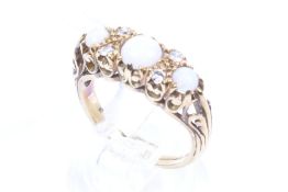 A mid 20th century gold, opal and diamond dress ring.