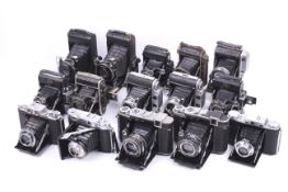A collection of medium format folding rangefinder cameras.