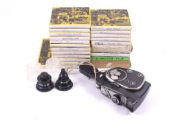 A collection of 54 8mm reel-to-reel films and a KMZ 8mm cine camera.