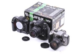 Three digital SLR cameras.