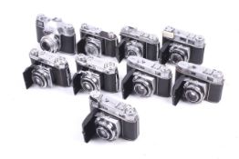 A collection of Kodak Retina cameras.