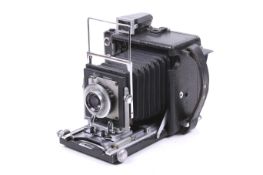 A Busch Pressman rangefinder press camera. With a Graflex 103mm f4.