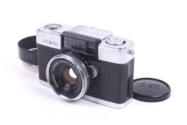 An Olympus Pen D 35mm half frame viewfinder camera. With an Olympus 32mm f1.9 F.