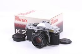 An Asahi Pentax K2 camera with a 50mm lens.