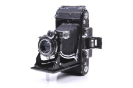 A Zeiss Ikon Super Ikonta 530/15 6x9 medium format folding rangefinder camera.