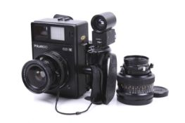 A Polaroid 600 SE instant rangefinder press camera outfit. With two lenses; a Mamiya 75mm f5.