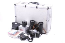 An Asahi Pentax K1000 35mm SLR camera outfit.