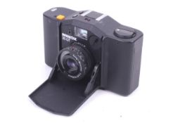 A Minox 35 GT 35mm camera. With a 35mm f2.8 Color-Minotar lens and case.