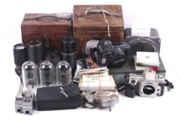 An assortment of cameras and accessories.