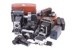 An assortment of cameras and accessories.