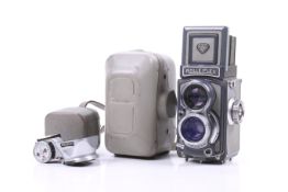 A Rolleiflex Grey Baby 4x4 TLR camera. Serial No. 2018626. With a Schneider-Kreuznach 60mm f3.