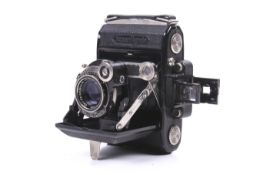 A Zeiss Ikon Super Ikonta 530 6x4.5 medium format folding rangefinder camera.