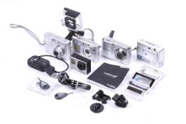 A GoPro Hero 3 Plus and four digital compact cameras.