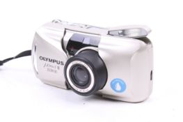 An Olympus MJU II Zoom 80 35mm compact camera. Silver. Serial No. 2785955.