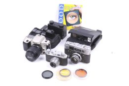 A collection of film cameras. To include a FED 4 with a 53mm f2.8 lens.