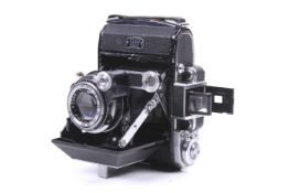 A Zeiss Ikon Super Ikonta 531 6x4.5 medium format folding rangefinder camera.