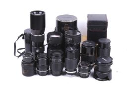 A collection of mostly Nikon and Nikon F mount lenses. To includea Nikkor 24mm f2.