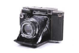 A Zeiss Ikon Super Ikonta 530/16 6x6 medium format folding rangefinder camera.