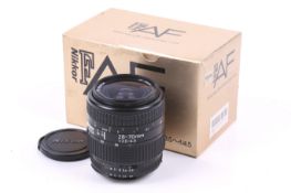 A Nikon 28-70mm f3.5-4.5 Zoom Nikkor F Auto Focus lens. With makers box.