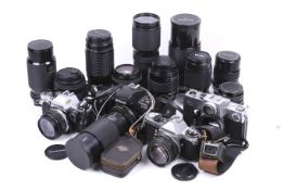 A large assortment of cameras, lenses and accessories. To include an Olympus OM10 with a 50mm f1.