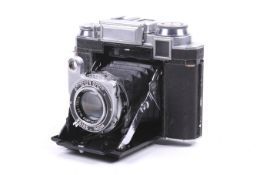 A Zeiss Ikon Super Ikonta 533/16 6x6 medium format folding rangefinder camera.