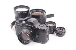 An Asahi Pentax Auto 110 sub-miniature SLR camera outfit.