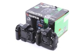 Two Fujifilm FinePix digital SLR camera bodies. To include an S1 Pro and an S3 Pro with makers box.