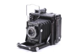 A Graflex Speed Graphic rangefinder press camera. With a Kodak 101mm f4.