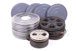 A collection of 16mm reel-to-reel cine films.