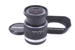 An Olympus OM System M.Zuiko Digital 9-18mm f4-5.6 mirrorless camera lens.