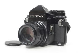 A late Pentax 67 6x7 medium format SLR camera. Serial No. 4200591. With an SMC Pentax 105mm f2.