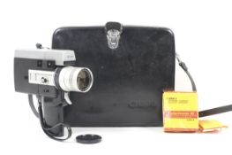 A Canon Auto Zoom 518 super 8 cine camera. With a 9.5-47.5mm f1.8 Canon Zoom lens and case.