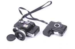 Two 110 sub-miniature SLR cameras. To include a Minolta 110 Zoom with a 25-50mm f4.