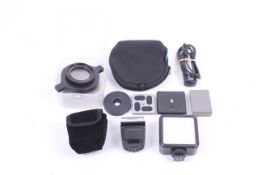 A small collection of camera accessories.
